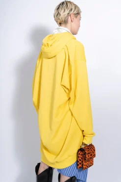 Marques ' Almeida Tops | ASYMMETRIC HOODIE WITH BIG EYELET YELLOW